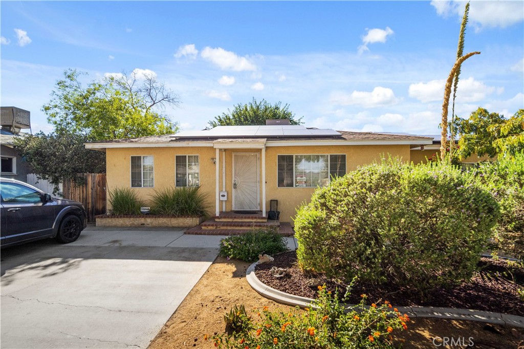 Welcome to 44309 Date Avenue! This home has upgrades galore. As you enter you will see fresh laminate wood flooring, marble counter tops in kitchen with stainless steel smart appliances. Both bathrooms are upgraded and updated with new vanities and shower/bath. Spacious back yard with a huge back garage and shop area which can be easily converted into a rental space! Solar panels cover almost the entire roof. central A/C & heat. BRAND NEW PLUMBING THROUGHOUT. built in tankless water heater and water filtration system.