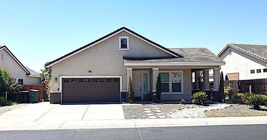 Welcome to a charming home located in the heart of Roseville! This delightful property boasts 1,696 square feet of living space with three spacious bedrooms, including a primary suite retreat, and two beautifully appointed full bathrooms, one featuring a sunken tub. The kitchen is designed for the culinary enthusiast, equipped with a gas cooktop, microwave, dishwasher, island, pantry, and garbage disposal, providing ample space for meal preparation and storage. Enjoy the warmth and elegance of wood flooring throughout and cozy up by the fireplace in the inviting living room. The home offers the convenience of inside laundry with electricity hookup for a washer and dryer. Situated within the Dry Creek Joint Elementary School District, this home is perfect for families seeking proximity to educational facilities. Additional features include central AC, forced-air heating, double pane windows, and a shed for extra storage. With a spacious 7,088 sq ft lot, there is plenty of room to create your outdoor oasis.