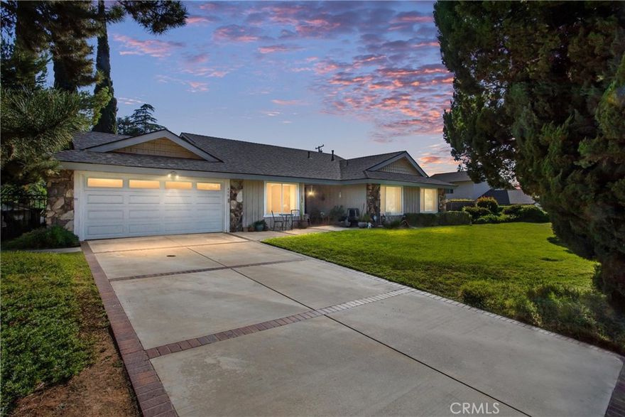 This home is just waiting for a new owner to bring it up to date and make it the loveliest home it can be.  The approach to the front door gives an immediate feel of privacy, even on the well traveled Sunset Dr.  Upon entering your greeted with an extra spacious living room and, with the addition of solar tubes, they will brighten the room nicely.  The kitchen has been updated and it also provides ample space for the dining room table and additional furniture.  Off the kitchen is the indoor laundry room with lots of cabinets and pantry.  Down the hall from the entry you will find the four bedrooms, a nice size bathroom and in the main bath you will find a powder room complete with a built in vanity.

Outside there is a wrap around patio which has a standard spa and a swim spa that is great for daily exercising.  As the patio wraps to the back there is plenty of room for outdoor entertaining with a picnic table and seating areas.  This area is overlooked from the living room and through the sliding French doors. The yard is totally private and there is plenty of room for a pool.  It also features an outdoor storage shed for gardening tools.   

This home is PRICED TO SELL.  Don't hesitate!!!