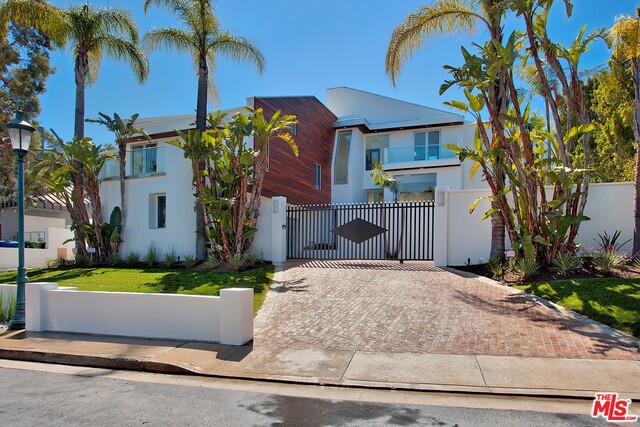 Exquisite Modern home in the guard gated Summit w/SPECTACULAR views. Fresh off of an extensive remodel. Magnificent open floor plan perfect for modern living & entertaining. The yard is an entertainer's dream that includes pool w/water feature, pool house/bar/cabana, fire pit and a standalone deck w/water feature. Kitchen is very open w/sleek custom cabinetry & state-of-the-art appliances. The elegant master is alone on the top floor w/den that can be made into an office, library or nursery; a large balcony; fireplace and his/hers closet with all new custom cabinetry. Master bathroom includes free standing tub, his/her showers and his/her toilets w/electronic function. Additional indoor/outdoor room w/spectacular views off the master bathroom is perfect for a massage area/yoga studio/gym. Fully smart home wired with state-of-the-art Crestron keypads & centralized speakers. Impeccable attention to detail. This home is a MUST SEE!!!! Buyer to verify sq footage. Approx. 7,000 sq ft