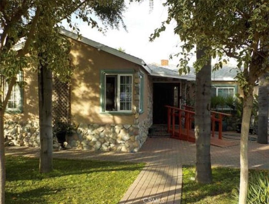 Very nice spacious single family one Level home. Zoned R3. Build up to eleven condos or apartments verified by the city of Los Angeles Planning Division. Check with city to verify. However there is other condos close to this property similar in lot size. Buyer to do their own due diligence. The outside yard has several fruit trees, grape, guava and lime.  Walking through the entrance find a spacious area for dining or office. To the left there is a nice bedroom and another bedroom suitable for the master bedroom. Just past the kitchen there is a a full bath and then a large family room with fire place and a nice walk in closet. Walking through the kitchen that is spacious with many cabinets find another full bathroom and two more bedrooms. 

Going outside through the kitchen find a large rear yard with a porch,a built in barbecue and To the right there is a large two car garage. Property needs some care.