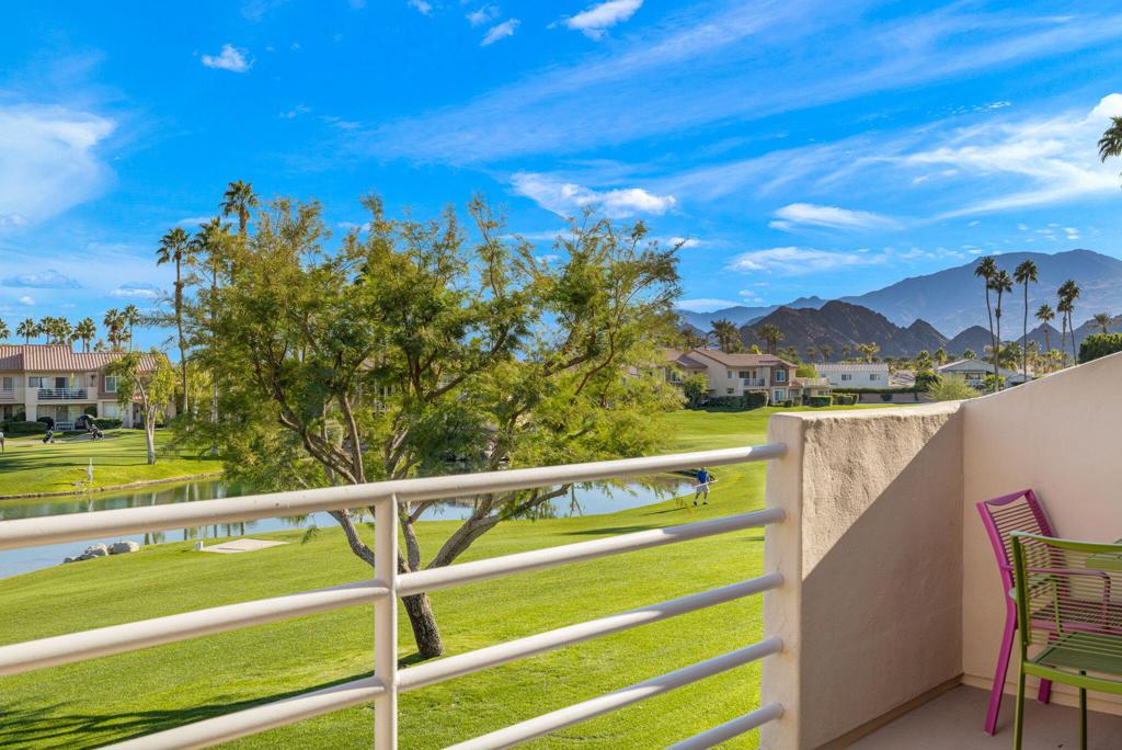 Rare upper level condo was the former Builders Model in Palm Royale. The best overall value in the city of La Quinta. This upper level penthouse condo is located in Palm Royale HOA which includes pools and spas throughout the community, clubhouse, building maintenance, pickleball courts, tennis courts, gym, Wifi and cable, and golf. Palm Royale is located directly across the street from the BNP Paribas Tennis facility. The condo is the best located unit in the development with elevated panoramic South East golf course, lake, and mountain views. Inside the condo it has a clean contemporary look which is perfect for someone seeking a lock n leave condo in the Coachella Valley. The living room has an open concept with amazing natural light from all angles, and vaulted ceilings. The balcony is perfect for entertaining guests and enjoying evening sunsets The power company for Palm Royale is IID which is historically way less expensive than SCE. Big Bonus! Please call today to schedule a private showing.