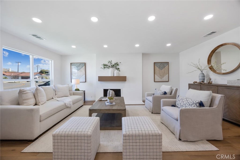 Coastal Living, Completely Reimagined! Experience the best of Huntington Beach in this fully remodeled 3 bed, 2 bath single-story retreat. Light-filled and airy, this home features new luxury flooring, windows, doors, kitchen, bathrooms, and modern finishes throughout. The open-concept design flows into a stunning new kitchen with custom cabinetry, sleek countertops, and high-quality appliances the perfect blend of style and laid-back beach living.
Significant enhancements include new electrical, plumbing, heating, central AC, a new sprinkler system, energy-star insulation, and a newer roof. Outdoors, feel the ocean breeze as you relax by the backyard fire pit, or watch children and or pets play on the fresh grassy area. New concrete work and easy-care landscaping make this space ideal for entertaining or unwinding under the stars.
Tucked into a peaceful neighborhood just minutes from the sand, dining, and shopping, this home delivers the full coastal lifestyle with the comfort of knowing every detail has already been taken care of. Simply move in and start living your Huntington Beach dream.