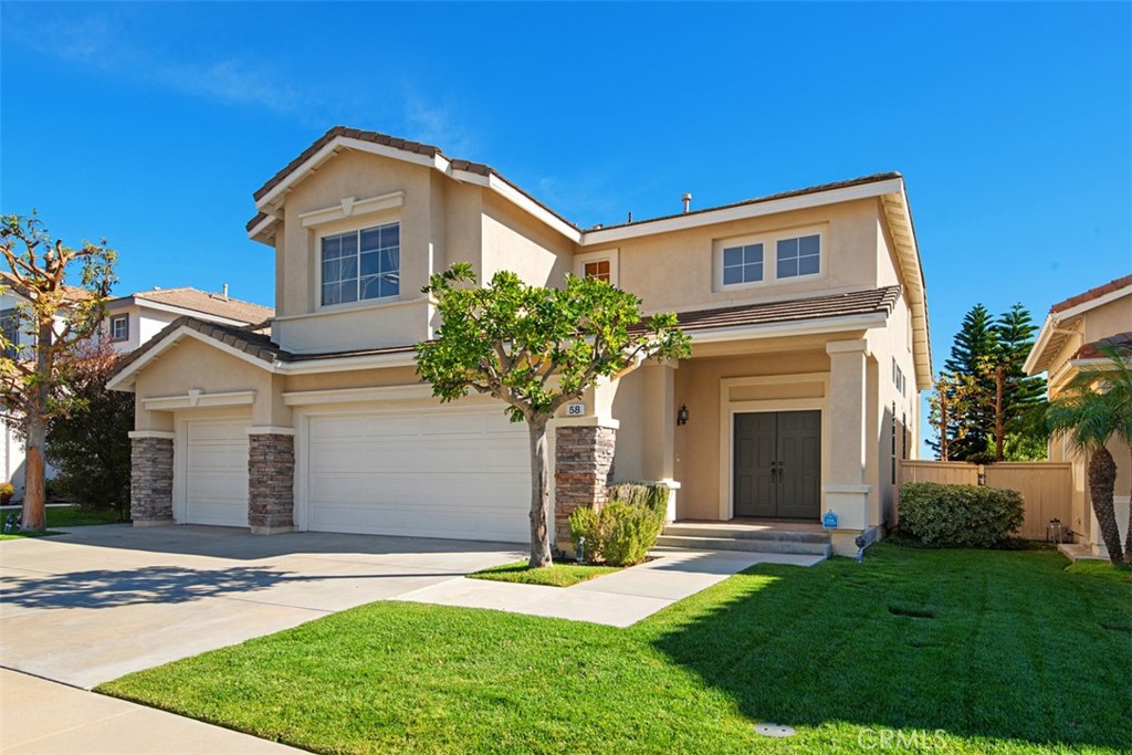 Move in now and pay $5,200 per month until November 30, 2025! A former William Lyon model home in the prestigious Laguna Audubon II, 58 Raven Ln sits on a premium lot and is filled with abundant natural light and positive energy. On a higher elevation, 58 Raven Ln has no neighbor behind and offers nice views of trees, mountains, and rooftops. 3 bedrooms upstairs plus office/den downstairs. Once you enter through the front door you are greeted with beautiful 12x24 ceramic tile floors, two-story ceilings, lots of windows, an open floor plan, and a formal living/dining room. The same floor tiles extend through the hallway and downstairs 3/4 bath. Laminated wood floors in living room, family room, and den/office. Wood floors on staircase and throughout upstairs. You will love entertaining in this home - the kitchen opens to the family room and overlooks the nice backyard. Remodeled kitchen is equipped with Quartz countertops and back splashes, double stainless-steel sinks, GE gas cooktop, range hood, and dishwasher. Refrigerator included. Double sinks in upstairs hallway bathroom. Ceramic floor tiles in all bathrooms, kitchen, and upstairs laundry room. Newer AC. Three-car garage with built-in storage cabinets. No pets and non-smoking only. Gardener included. Tenant pays all utilities. Five-minute drive to Aliso Viejo town center which offers a good variety of restaurants, movie theaters, and shops. Close to the beach, golf course, restaurants and shopping, and easy access to 133 Hwy.