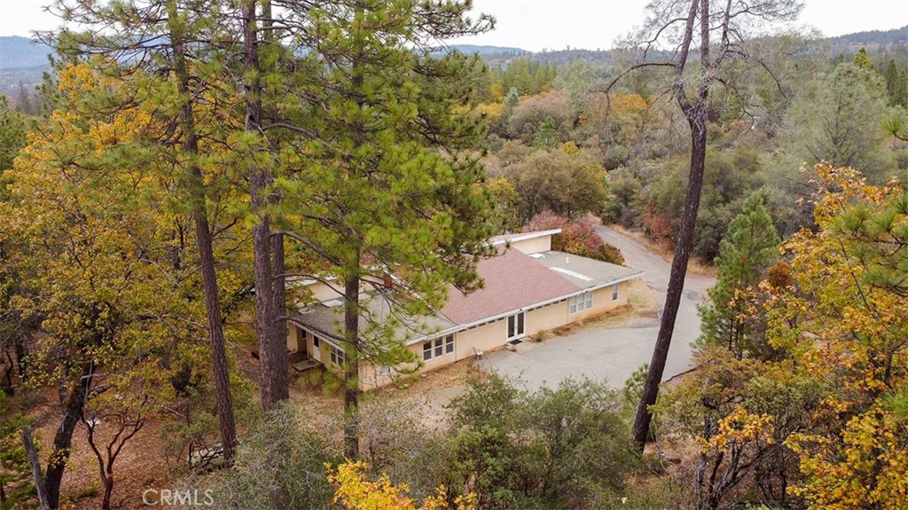 Remarks
Multiple personalities! Use your innovative imagination to consider the many possibilities for this custom architect-designed office building on 7.32 awesome acres. All 10 offices can become housing units, classrooms, and/or a combination of business and onsite living use. The seller says the county will allow conversion into a residence and/or AirBnb accommodations. The spacious interior features a full kitchen, two bathrooms, a lobby and utility room. The landscaped exterior showcases a Japanese garden, pleasant courtyard, two parking lots and lush acreage. Additionally, the picturesque property with paved road access includes a storage shed plus a currently rented mobile home with its own driveway and private surroundings. Horses and livestock are also welcomed. Located in a peaceful yet vibrant setting in an attractive rural neighborhood zoned for commercial, agricultural and residential usage, this hidden gem can remain as is or be transformed into numerous new identities. The foothills provide a stable, serene environment without compromising on convenience. Shopping, services, schools and several lakes are nearby and urban centers are an easy commute. Experience a relaxed country lifestyle with city amenities. Get creative, get going and get in on a great opportunit