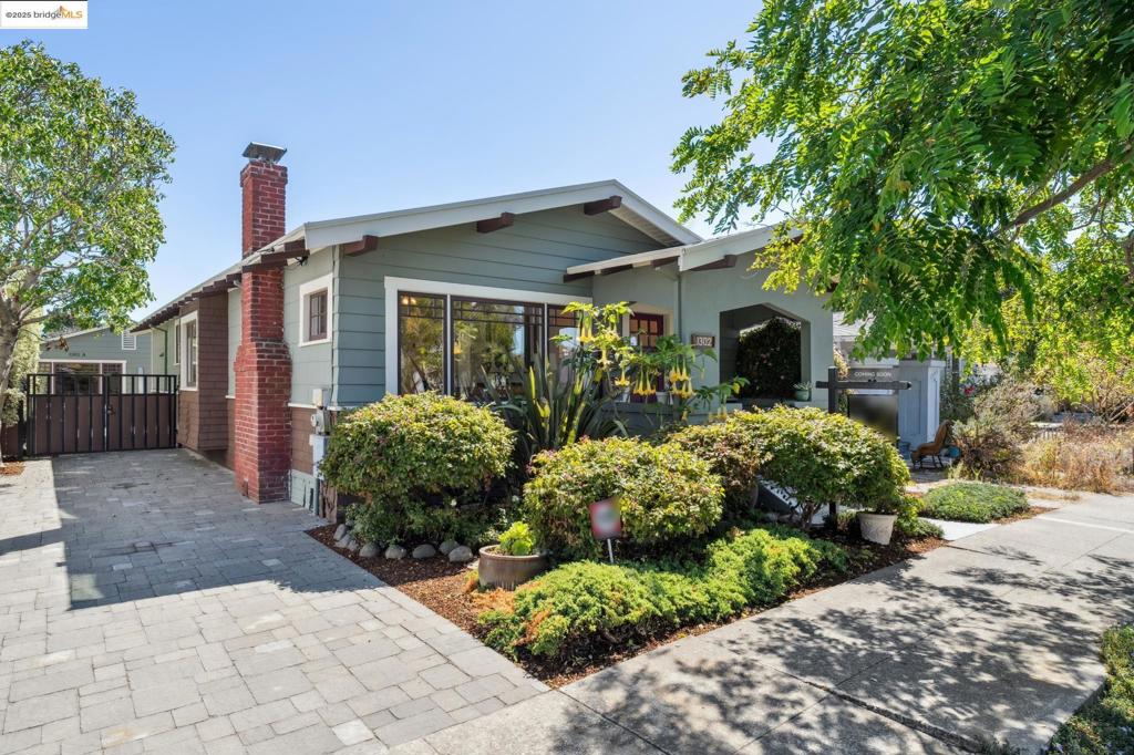 Welcome to this delightful 3-bedroom, 2-bathroom Craftsman home that beautifully blends timeless character with modern convenience. Step inside to find the warmth of classic wood detailing, inviting living spaces, and cedar-lined closets that add both charm and function. The home is equipped with owned solar panels, offering energy efficiency and cost savings for years to come. Adding to its appeal, the original garage has been thoughtfully transformed into a fully permitted Accessory Dwelling Unit (ADU). Whether used as a rental, a private guest retreat, or a spacious home office, the ADU provides exceptional flexibility and income potential. Even with the garage conversion, there is still ample off-street parking for 2+ vehicles, a rare and valuable feature in this neighborhood. Located in the heart of Berkeley, this home is just moments away from neighborhood parks, local shops, cafés, and convenient transit options. With its blend of historic Craftsman charm, practical updates, and versatile living spaces, 1302 Channing Way is a home ready to grow with you for years to come.