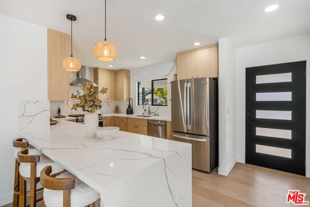 Photo of 6150 Sylvia Avenue, Tarzana, CA 91335 (MLS # 26994897)