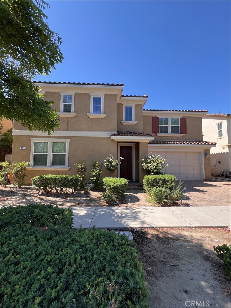 Located in the gated Parkside Community, which includes amenities such as a swimming pool, clubhouse, playground, dog park, and fire-pit lounge. Easy access to major FWY10, 15, 210, Ontario International Airport, Metrolink station, and Ontario Mills shopping center. Adjacent to Cucamonga-Guasti Regional Park offering outdoor recreation. Total of 4 bedrooms with 1 bedroom downstairs and total of 3 bathrooms with one bath downstairs and two up. (Although county record shows 3 bedroom and 2.5 baths). Modern open-concept great room with high ceilings and floor-to-ceiling windows offering abundant natural light. Granite kitchen countertops and large pantry. Spacious loft upstairs that is ideal for a study, media room, or bonus living space. Upper-level laundry room with built-in cabinetry. Carpeting upstairs and tile wood-style flooring downstairs. Single family house style with no connecting wall. Solar panel is paid by landlord. Fantastic gated community with amenities for client's family. Just minutes to Ontario Airport and major freeways.