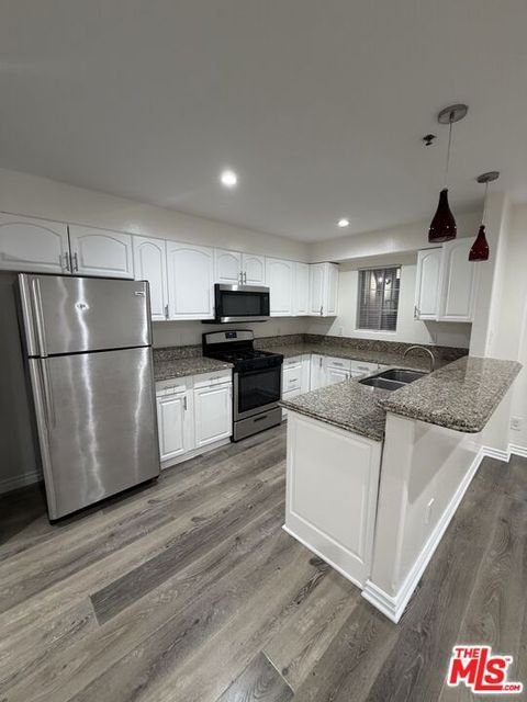 Photo of 121 S Rampart Boulevard #3, Los Angeles, CA 90057 (MLS # 25619247)