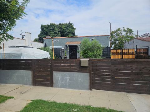 Photo of 5820 Cimarron Street, Los Angeles, CA 90047 (MLS # RS25177850)