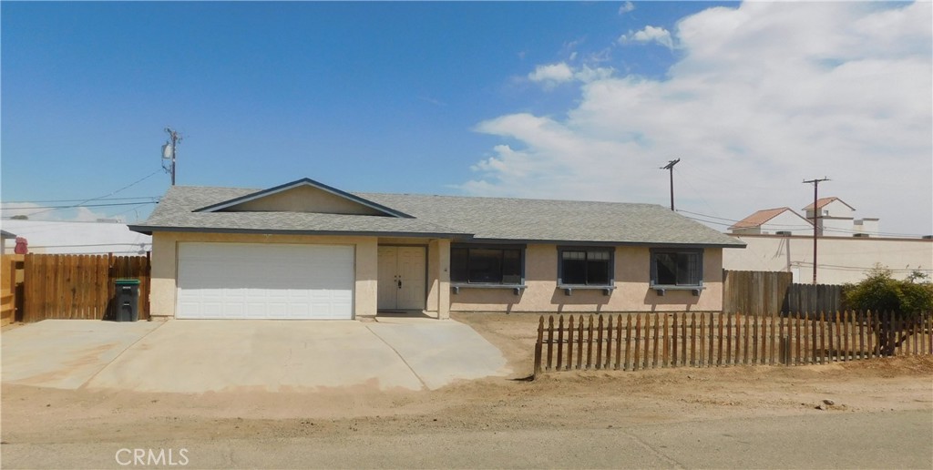 3 + 2 home on natural gas, Home has nice open floor plan with lovely fireplace in living room.
Kitchen has built in stove and dishwasher. Also, included is refrigerator and countertop microwave. All 3 bedrooms are a good size with a walk- in closet in the master bedroom. Front of home has a covered patio area while the fenced backyard has a large, covered patio. 2 care attached garage with washer/dryer hookups. A MUST SEE.