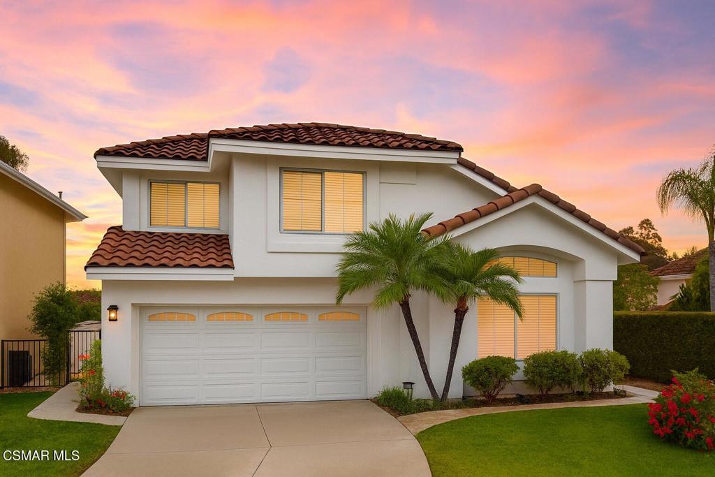 Located in the prestigious Hillcrest Estate community, this Oak Park gem offers an ideal blend of suburban tranquility and urban convenience. Perfectly positioned in the city's heart, this residence is within close proximity to an array of restaurants, shops, and a Starbucks. This luminous home boasts an open floor plan with vaulted ceilings, flooding the interior with natural light. The well-maintained 3-bedroom, 2.5-bathroom home features elegant upgrades, including exotic walnut hardwood floors, a new roof, and a built-in alarm system. The updated gourmet kitchen, equipped with granite countertops, professional-grade Thermador stainless steel appliances, and travertine flooring, flows seamlessly into the adjacent breakfast nook, family room, and backyard. The family room, adorned with a marble and travertine fireplace, offers a picturesque view of the beautifully landscaped backyard, designed for effortless entertaining. The private backyard is a true oasis, featuring a large built-in barbecue area with an outdoor refrigerator, mature vines draping the walls, and a charming corner fountain that evokes a vacation-like ambiance. The spacious primary bedroom showcases vaulted ceilings, a double-sided fireplace, and a luxurious en-suite bathroom with dual sinks, a walk-in closet, a large tub, and a separate shower. Upstairs, two additional bright and generously sized bedrooms have access to a full bathroom with a bathtub/shower combo. Attention to detail is evident throughout, from the stone walkway and patio to the mature landscaping and recessed lighting, all contributing to the home's warm and inviting atmosphere. With top-rated schools, hiking, biking trails, and parks nearby, this residence perfectly combines comfort, prime location, and convenience.