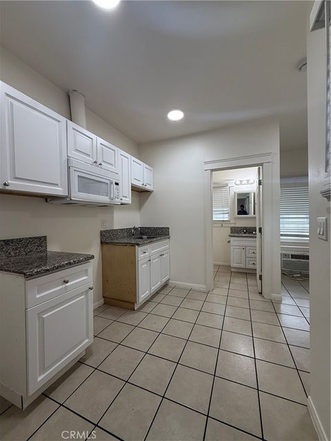 Photo of 718 Chestnut Avenue #15, Long Beach, CA 90813 (MLS # OC26156849)