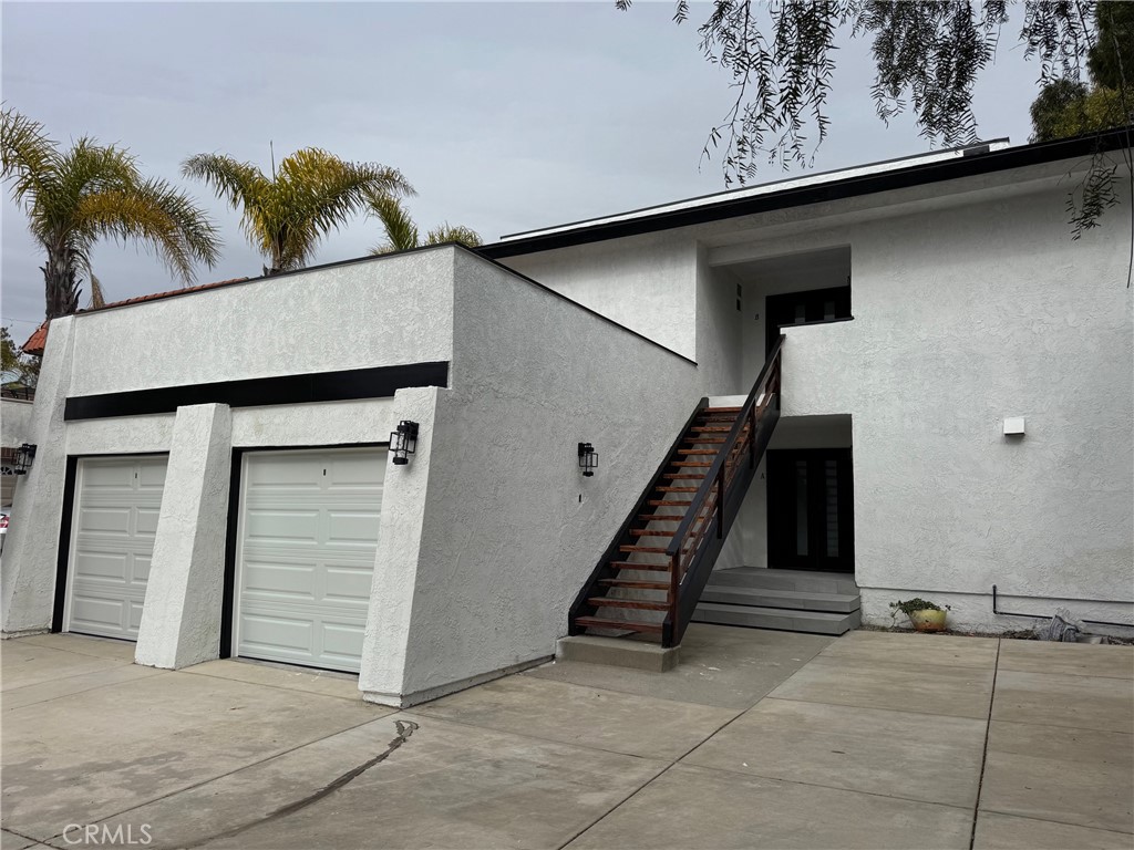 Step into modern elegance with this stunning totally remodeled Upstair home. Featuring 3 spacious bedrooms and three full bathrooms, all designed for comfort and style. This home boasts an open concept layout, with many abundant light. The kitchen has premium finishes throughout, countertop and large island, which is perfect for entertaining. Open living room with direct access to secluded backyard. The Primary suite offers a spa-like bathroom, and generous walk-in closet. Each additional bedroom is thoughtfully designed, an en-suite bedroom and another one with cross-the hall bathroom. In-unit Laundry room is equipped with washer-dryer for conveniences. This home is located in a desirable neighborhood with easy access to many city amenities, such as dining, shopping, as well as water sports, Ocean swim activities, and many concerts at Doheny State Park and Beach. Move-in ready.
