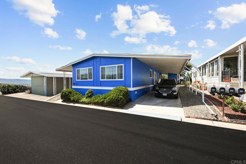 Welcome to Ocean Bluffs Mobile Home Estates, a desirable gated 55/40 community in the heart of Otay Mesa West. This spacious 3 bedroom, 2 bath home also features an additional room perfect for an office or den. The home boasts an updated kitchen with modern cabinets, quartz countertops, a stylish backsplash, a large kitchen island, and stainless steel appliances. Enjoy the open-concept layout with high ceilings, vinyl flooring, and a laundry room for added convenience. The primary suite offers a double sink vanity, bathtub, and separate shower. Outside, you’ll find a private backyard, two storage sheds, and two parking spaces. The community allows up to two pets (max 30 lbs each). Residents enjoy access to top-notch amenities, including a pool, spa, clubhouse, recreation room, RV parking, and scenic walking paths. Conveniently located near shopping, dining, and major transportation routes, this home offers both comfort and accessibility. ?? Space rent: $1,827 per month. Financing available. ? Move-in ready! Call today for a private showing.