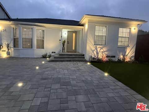 Photo of 1825 Stearns Drive, Los Angeles, CA 90035 (MLS # 26852831)