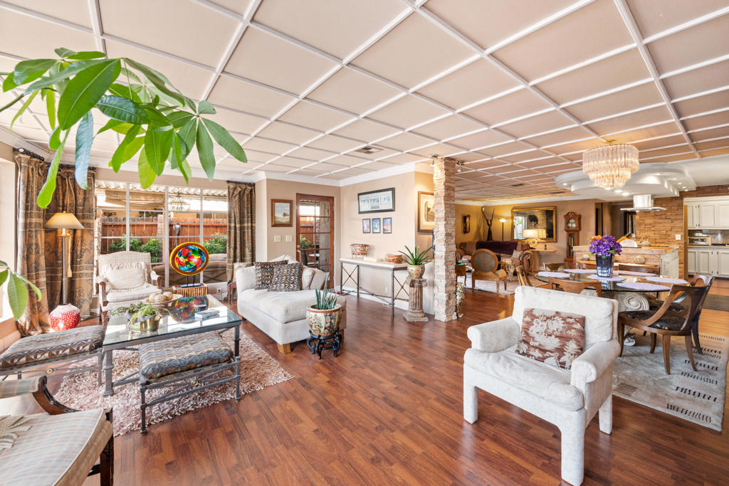 This home is truly unique. With over 2100 sq ft of living space there is lots of room within this open floor plan to relax or entertain family and friends. Mountain views are enjoyed from the expansive living, dining and family room. Wood and laminate flooring, crown molding, and recessed lighting on dimmer switches are a few of the interior amenities. If you love to cook you'll enjoy the updated kitchen with 5-burner gas cooktop in the center island. The main bedroom features an ensuite with soaking tub, tiled shower and dual vanities. Another bedroom, also with ensuite has patio access. The third bedroom is currently utilized as a den/office. There is also a hall bathroom. The laundry room has a sink and multiple storage cabinets. A covered patio is the perfect place to relax and enjoy the outdoors. Enjoy the amenities in this 55+ RENT CONTROL community offering pools, spas, clubhouse, fitness and RV/Additional vehicle storage. No HOA. The PARK owns the Land. SPACE RENT is $695.99 /month including water, sewer and trash pick-up. Conveniently located to Trader Joes, Target, dining hiking, Tahquitz Public Golf and within minutes to Downtown Palm Springs.