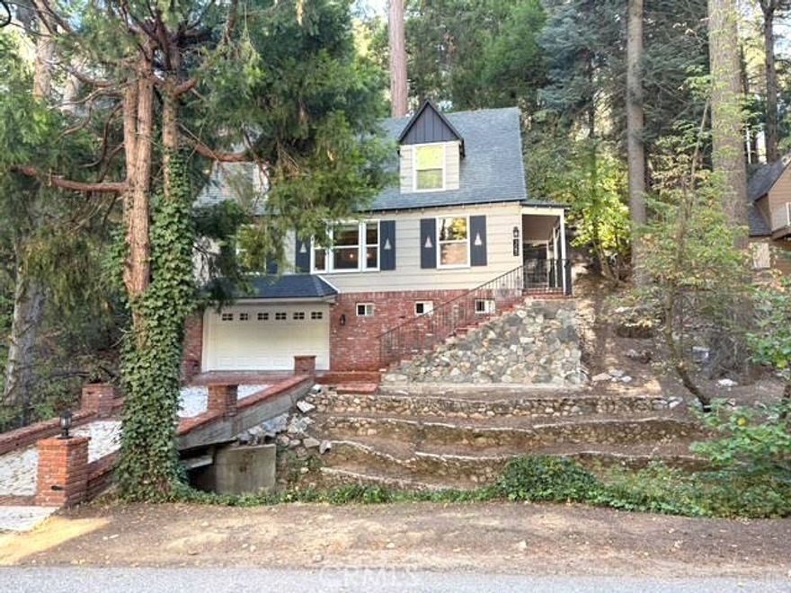 Beautifully Remodeled Lake Arrowhead Home with Lake Rights



Welcome to this well-loved 3-bedroom, 2-bathroom home located in one of Lake Arrowhead’s most desirable neighborhoods. Recently renovated, it features a modern kitchen with newer appliances, stylish finishes, and plenty of natural light. The spacious living room, kitchen, and dining areas flow seamlessly together, creating a warm and inviting atmosphere for family gatherings. A large open floor plan showcases picture windows, a striking stone fireplace, and an open kitchen with a breakfast bar, abundant counter space, and generous storage—perfect for hosting holidays and entertaining.



Additional highlights include mountain charm throughout, a two-car garage with a newly finished epoxy floor, and a laundry/workshop/utility area in the build-up next to the garage. Enjoy full lake rights along with the convenience of being just a short walk to Lake Arrowhead, the Village, and all the restaurants, shopping, and entertainment the area has to offer.



This move-in-ready home blends timeless mountain character with modern upgrades, making it the perfect vacation retreat or full-time residence.