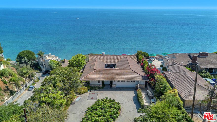 FURNISHED AND AVAILABLE FOR IMMEDIATE OCCUPANCY. Perched above broad and sandy Paradise Cove, sits the ideal Malibu beach retreat. Stunning post and beam, fully appointed and furnished from top to bottom with the very best of everything! Gated compound sits on almost an acre of beautiful grounds. The main residence has sweeping ocean views, 2 bedrooms, 3 baths, a large open concept kitchen, family, dining and living rooms, and a charming central courtyard. There are also two separate guest houses, each with kitchenettes and furnished with full amenities. Enjoy entertaining on the expansive oceanfront patio w/fire pit, outdoor dining area w/BBQ and absolutely incredible 180-degree ocean and shoreline views. Lounge around the sunny pool area or enjoy playtime on the large grassy lawns. Gated path to the beach! All on private/gated Sea Lane Drive. Total bed/bath count is for the main house and guest houses. Floorplans shown in PHOTOS. Call about Summer rates.