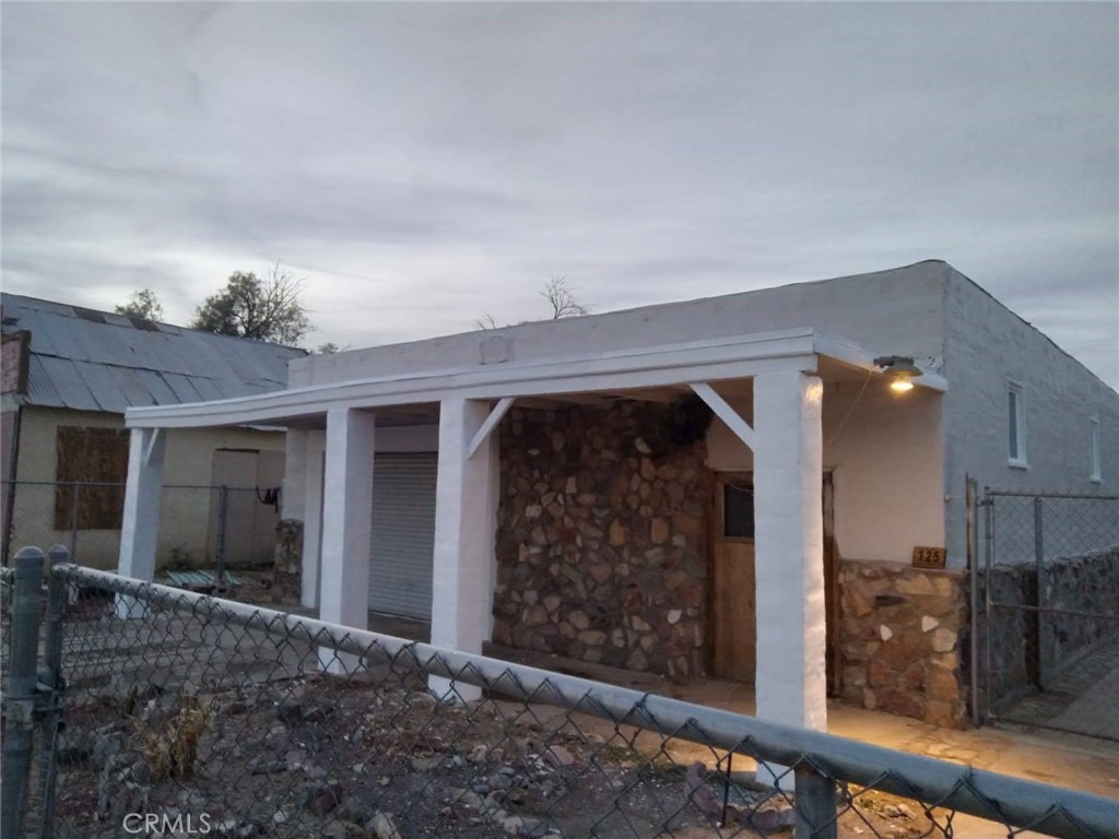 Unique Residential & Commercial Property with Versatile Potential!
Discover a rare opportunity in the heart of Yermo! This property features a 1,000 sq. ft. shop/garage w/ 1/5 bath at the front, offering ample space for business, storage, or personal projects. In the rear, a charming 1,304 2-bedroom residence awaits, complete with a huge galley kitchen featuring rich oak cabinetry—ideal for family meals or entertaining guests.
Nestled on a fenced lot with rear alley access and a convenient carport, this property is centrally located and offers both privacy and easy accessibility. The tenants are set to move out by May 30th.
Recent updates include termite treatment and a septic system pump and certification in 2022, ensuring peace of mind for any potential buyer. The seller, who is also the listing agent, offers private financing options with 30% down, providing a great path for securing this unique gem.
Whether you’re looking for a live-work setup, a space for your business, or an investment with limitless possibilities, this property checks all the boxes. Don’t miss out on the opportunity to own a one-of-a-kind property with endless potential!