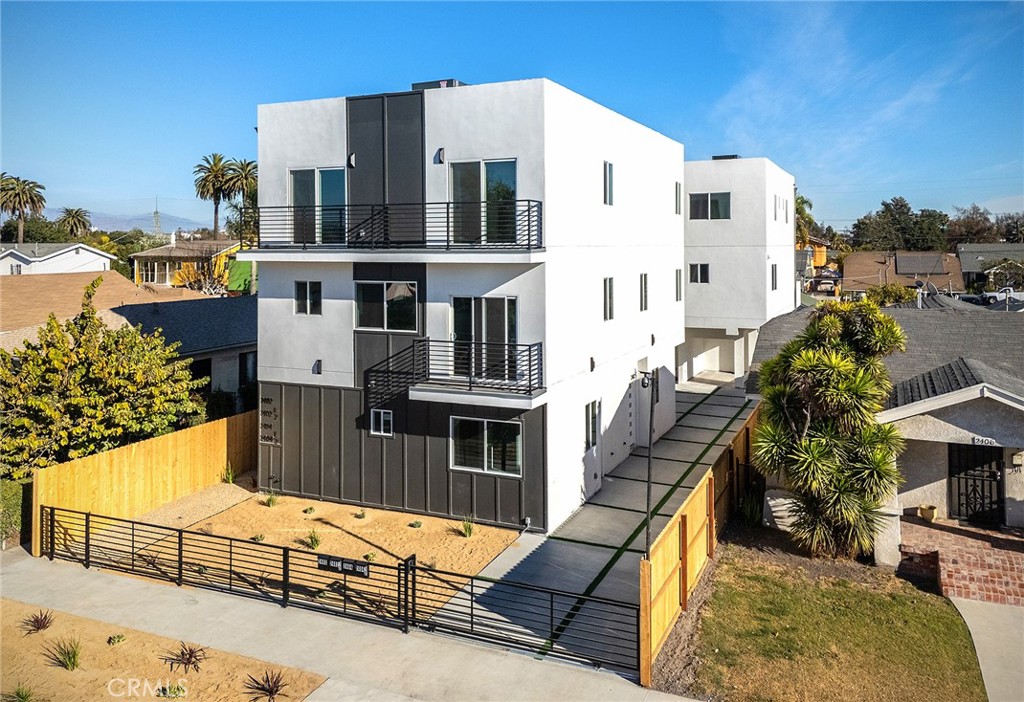 2404 S Cochran Ave is a brand-new, non-rent controlled, FULLY LEASED fourplex in the heart of West Adams—one of Los Angeles’ most vibrant and sought-after neighborhoods. Nestled on a charming tree-lined street just moments from the trendy Highly Likely Café, this stunning property will generate over $227k in annual rent and a real 5.94% cap rate, offering an exceptional return on investment. With housing availability at an all-time low, this new construction fourplex offers investors a rare opportunity to own a property with consistent rental demand. Given the increased need for quality housing, this is an investment that stands strong in today’s market.
The fourplex (triplex + ADU "in name only") consists of three spacious 4-bedroom townhomes and one 3-bedroom unit, all thoughtfully designed to maximize space and functionality. Each unit is separately metered for utilities, ensuring minimal operating costs, and the property is backed by a 1-year builder’s warranty for peace of mind. Modern, open-concept layouts feature high-end designer finishes, stainless-steel appliances, abundant natural light, and large windows that enhance the living experience. Additional highlights include expansive living areas, large front and rear-facing balconies, and sleek contemporary designs tailored to meet the demands of today’s renters.
Positioned in the thriving West Adams neighborhood, the property guarantees high tenant demand and strong long-term appreciation. With its low-maintenance design, upscale units, and unbeatable location, 2404 S Cochran Ave is an exceptional opportunity for investors looking to secure a premium property in a fast-growing market.