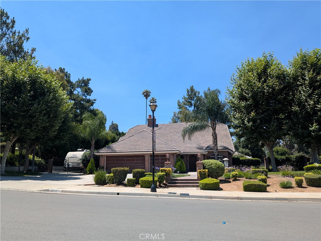 Welcome home to the exclusive community of Hawarden Hills! If there was ever a property that depicted the meaning of “turnkey”, this is it! It’s been remodeled and is absolutely breathtaking. This perfect family home is minutes from schools and various shopping centers. With 2903 sqft of living space, 4 bedrooms, and 3 baths, this property sits on a huge 23,000+ sqft corner lot. Upon entry, you'll be welcomed to an open living room with a connected dining room. The kitchen has been immaculately designed with a taste of Tuscany. It radiates class with upgraded granite countertops, a built-in Sub-Zero refrigerator, Wolf cooktop, soft close drawers, and hidden compartments. Whether you’re a professional chef or the average Joe, this is a kitchen anyone would be proud of. The cozy family room is complete with an entertainment center, wet bar, and a grand fireplace, perfect for snuggling during those chilly nights. The HUGE bonus room is right through a door off the family room. This was used as game room/man-cave but could be for pretty much anything. Whether it's a playroom, exercise room, office, or a 5th bedroom complete with a closet, the possibilities are virtually endless. A large laundry room is on the other side of the family room and has a laundry chute from the second floor and a built-in ironing board. The laundry room also leads to the three-car garage with a huge accessible attic with tons of storage space. The main floor also has a bedroom and 3/4 bath just down the hall from the family room. The main bedroom has its own fireplace and balcony access overlooking the pool, while the ensuite has dual sinks, a jacuzzi tub and a walk-in closet. There are two additional bedrooms and another full bath upstairs. Both bedrooms come complete with huge walk-in closets, and one also exhibits balcony access. The backyard is an entertainer’s dream. It wraps around to three sides of the property and aside from the large lap pool and jacuzzi, there’s also a built-in BBQ and a large gazebo, perfect for summer gatherings. This property also offers several other amenities such as RV access/parking w/ full hookups, a whole house fan for quick cooling without turning on the A/C, paid off solar panels, and a built-in gas-powered Generac system in case of power outages. This house has just about everything and is move-in ready. Don’t let this opportunity pass you by. Do yourself a favor and come see what this place is about before it's too late!