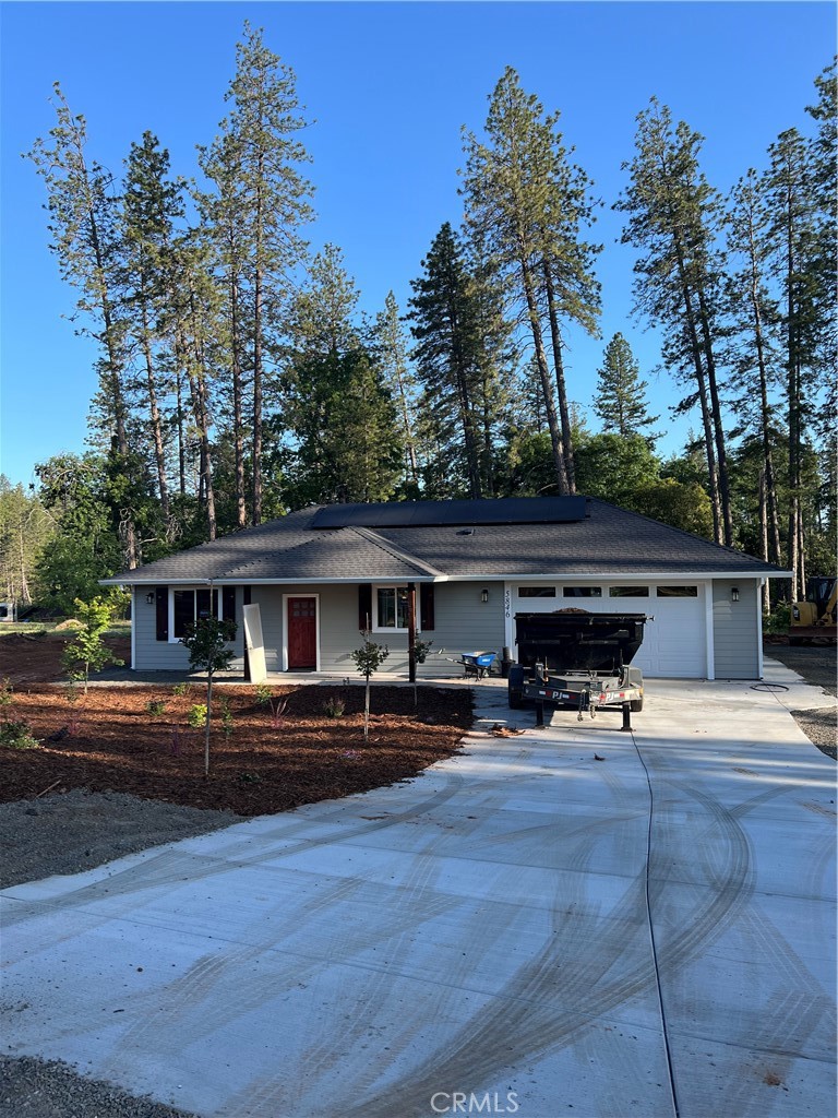 This stunning 2 bedroom, 2 bathroom home built by local Builder Frost Construction is now available for sale! Owned Solar 3.04 KW system and large .46 acre lot size. Boasting a generous 1,021 square feet of living space, this home features top-notch craftsmanship and modern amenities. Upon entering, you'll be greeted by a charming 96 square foot covered front porch with a craftsman-style front door and custom shutters. Step inside to discover an open floor plan that seamlessly connects the living room, kitchen, and dining area. The kitchen is a chef's dream with granite countertops, stainless steel appliances, recessed LED and pendant lighting, and a stylish island for added convenience. The primary bedroom is a serene retreat with crown molding, a slider leading to the covered patio, and a well-appointed en-suite bathroom featuring granite counters and a step-in shower. The guest bedroom also offers crown molding and access to a sleek guest bathroom with granite countertops and a tub/shower combination. This home is equipped with a 8-panel owned solar system for energy efficiency and features gorgeous Vinyl Plank flooring throughout. Outside, you'll find a spacious 114 square foot covered patio with recessed lighting and a ceiling fan, perfect for outdoor entertaining. RV, Boat or Trailer Parking over 40ft in length and 20 ft. wide. Fantastic Opportunity. Additionally, the oversized two-car garage, measuring 23'5" wide by 25'10" deep, includes a laundry area and plenty of space for a boat, trailer, or RV parking. Don't miss out on the opportunity to call this beautiful home yours!