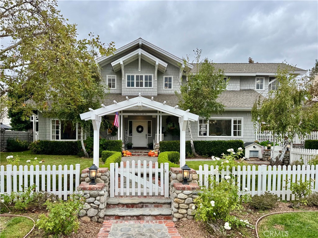 Welcome to 23181 Via Celeste, a modern farmhouse estate behind the gates of Coto de Caza. This five-bedroom, four-and-a-half-bath Craftsman home with an office and large bonus room offers the size, upgrades, and privacy that define Coto living.
The main level features open living areas with custom distressed hardwood floors, crown molding, and designer lighting. The chef’s kitchen includes beamed ceilings, quartz countertops, a large island with secondary sink, ample seating, and a walk-in butler’s pantry. Premium Sub-Zero refrigerator and Viking range and oven combine performance with timeless design. A formal dining room with brick flooring and fireplace adds warmth and elegance.
The family room connects to a wood-accented library, creating an open and inviting space for entertaining. A custom brick fireplace and built-in entertainment wall anchor the room, which is large enough for gatherings of any size.
Upstairs, the primary suite offers vaulted ceilings and a spa-style bath with a freestanding soaking tub, dual vanities, quartz counters, and walk-in glass shower. Four additional bedrooms, including one ensuite, provide flexibility for guests, home office, or gym. Upstairs laundry adds convenience.
The backyard delivers resort-style living with a pool and slide, spa, grotto, and outdoor shower. An open outdoor kitchen with built-in BBQ, seating area, and fire pit is perfect for entertaining. A large balcony with fireplace and heater overlooks the pool and spa from the second story, while a gated courtyard with basketball hoop adds recreation for all ages.
Additional features include paid solar, house water filtration system, 220V EV plug, extra storage room, and extended driveway with ample parking.
Experience the Coto de Caza lifestyle—golf and racquet club, pickleball and tennis courts, equestrian center and trails, biking and hiking trails, community pool and spa, on-site restaurants, and miles of open space. Live securely and comfortably in one of South Orange County’s most sought-after gated communities.