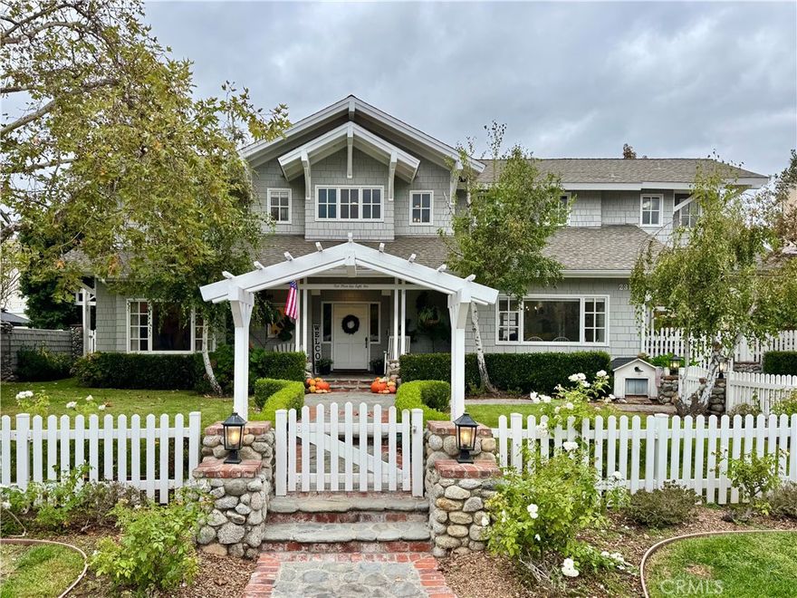 Welcome to 23181 Via Celeste, a modern farmhouse estate behind the gates of Coto de Caza. This five-bedroom, four-and-a-half-bath Craftsman home with an office and large bonus room offers the size, upgrades, and privacy that define Coto living.
The main level features open living areas with custom distressed hardwood floors, crown molding, and designer lighting. The chef’s kitchen includes beamed ceilings, quartz countertops, a large island with secondary sink, ample seating, and a walk-in butler’s pantry. Premium Sub-Zero refrigerator and Viking range and oven combine performance with timeless design. A formal dining room with brick flooring and fireplace adds warmth and elegance.
The family room connects to a wood-accented library, creating an open and inviting space for entertaining. A custom brick fireplace and built-in entertainment wall anchor the room, which is large enough for gatherings of any size.
Upstairs, the primary suite offers vaulted ceilings and a spa-style bath with a freestanding soaking tub, dual vanities, quartz counters, and walk-in glass shower. Four additional bedrooms, including one ensuite, provide flexibility for guests, home office, or gym. Upstairs laundry adds convenience.
The backyard delivers resort-style living with a pool and slide, spa, grotto, and outdoor shower. An open outdoor kitchen with built-in BBQ, seating area, and fire pit is perfect for entertaining. A large balcony with fireplace and heater overlooks the pool and spa from the second story, while a gated courtyard with basketball hoop adds recreation for all ages.
Additional features include paid solar, house water filtration system, 220V EV plug, extra storage room, and extended driveway with ample parking.
Experience the Coto de Caza lifestyle—golf and racquet club, pickleball and tennis courts, equestrian center and trails, biking and hiking trails, community pool and spa, on-site restaurants, and miles of open space. Live securely and comfortably in one of South Orange County’s most sought-after gated communities.