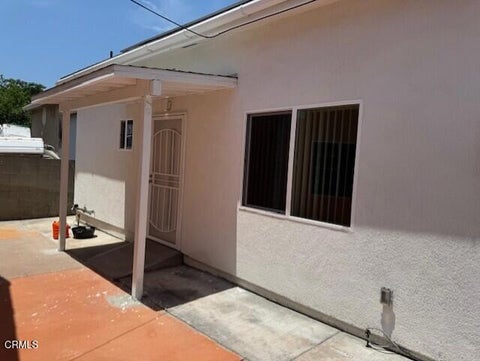 Photo of 7747 Valmont Street, Los Angeles, CA 91042 (MLS # P1-28994)