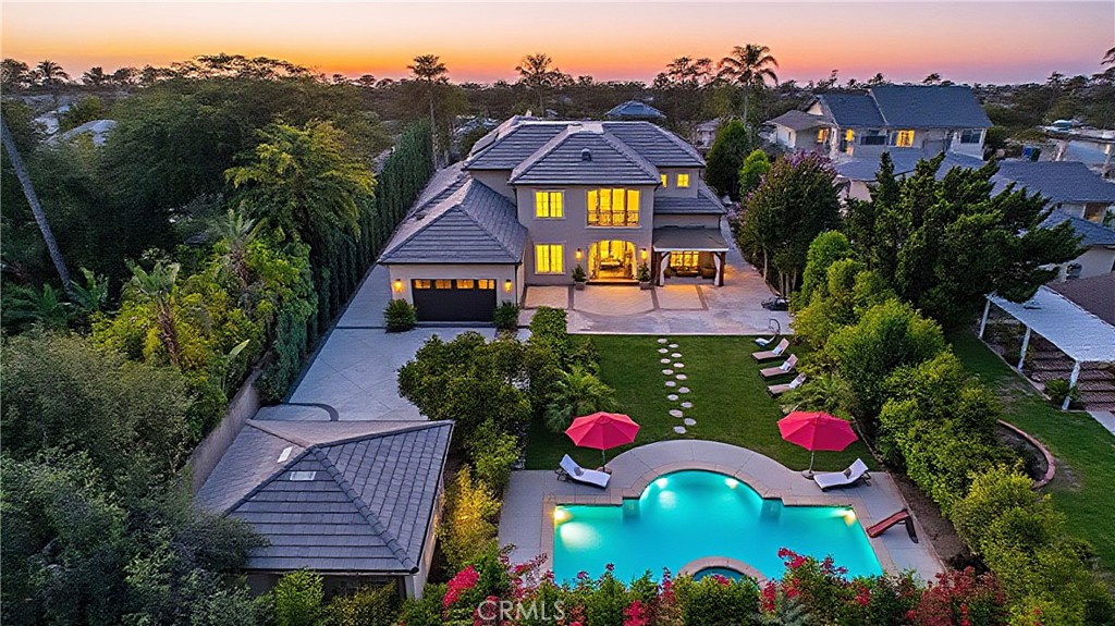 Spectacular Contemporary French Estate, designed by renowned architect Robert Tong, in Prestigious Tree-Lined Neighborhood completed in 2015. This exquisite estate home is nestled in a quiet, prestigious neighborhood, offering an exceptional blend of luxury, sophistication, and meticulous craftsmanship. Built with the highest quality materials and an eye for every detail, this residence delivers timeless elegance and modern comfort. Inside, the home welcome you with soaring two-story grand foyer features a chandelier with motorized lift, an elegant spiral staircase, and elevator access to all levels, boasts circular dome ceiling adorned with double and triple crown moldings, designer light fixtures, and custom casement windows. Flooring includes marble, travertine, rich hardwood, and carpet throughout.
The formal living room impresses with 2-story ceiling and a fireplace, while the private library includes custom built-ins. Additional spaces include a game room with custom wet bar, formal dining room, and a spacious family room with views of the exterior courtyard—complete with fireplace—and the serene rear yard. Entertainment is elevated with a state-of-the-art theater room equipped with immersive surround sound. The gourmet kitchen is a chef’s dream, featuring a large central island, Wolf Professional Series appliances, Subzero refrigerator, custom cabinetry, separate wok kitchen, and a generous walk-in pantry. Every bedroom is a suite. Each bedroom is a private suite. The luxurious master suite offers a private sitting area, a large balcony, and an terrace with sweeping views of the backyard. It also features a huge walk-in closet with custom organizers and a spa-like bathroom with a Jacuzzi tub and steam shower. Additional features includes a wholehouse water softener system.
Outside, the professionally landscaped yard showcases a sparkling heated pool and spa, plenty of fruit trees, gazebo, perfect for relaxation or entertaining. Additional amenities include full security alarm and surveillance system, paid solar panels, a four-car garage, gated U-shaped driveway for easy access and additional guest parking. Don't miss the opportunity of lifetime to call this Home!