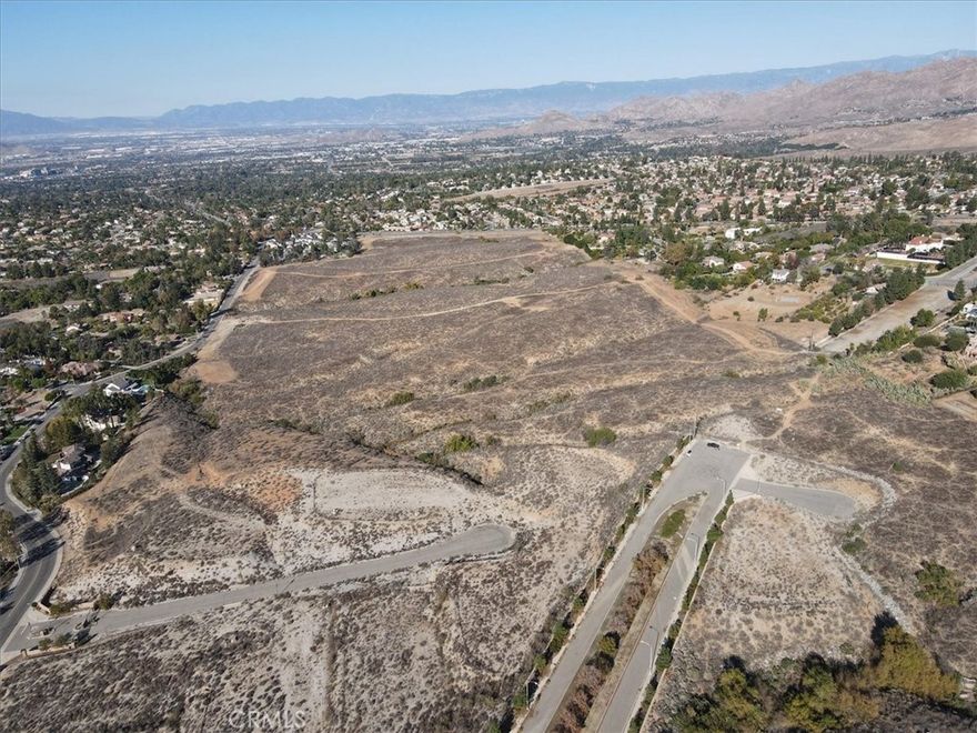ALESSANDRO HEIGHTS - HILLCREST ESTATES - This 4.17 acre parcel offers beautiful panoramic city and mountain views and is located in one of Riverside's finest neighborhoods.  Zoning is RC (Residential Conservation) and lot is currently unimproved, raw dirt.  Electricity, water and gas are nearby but not connected; surrounding homes are on septic systems.  All interested parties are advised to fully research the parcel with all municipal and utilities departments, including contacting the City of Riverside's Planning Department for more information on the Residential Conservation zoning requirements.  No HOA! No Mello Roos!  Low Taxes!  Seller is looking for cash offers and not interested in seller financing at this time.