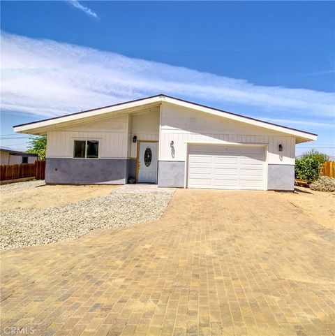Photo of 74804 Serrano Drive, 29 Palms, CA 92277 (MLS # JT26068367)
