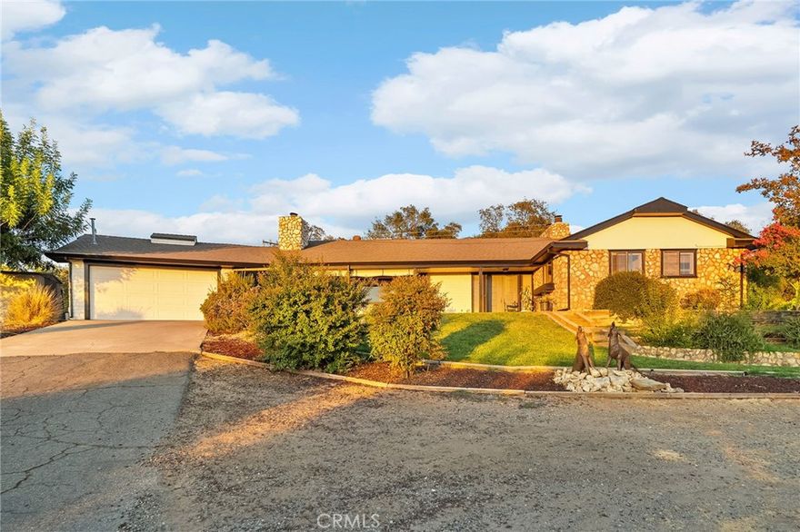 Welcome to 385 Dunstone Dr, a rare opportunity to own 14.42 acres with panoramic views of the Sutter Buttes and sweeping valley. This spacious home offers just over 2,000 sq. ft. of comfortable living space with 3 bedrooms, 2 bathrooms, and multiple gathering areas including a formal living room with fireplace, a cozy family room, and even a fireplace in the master suite.



Recent updates include new laminate flooring installed throughout portions of the home, blending modern style with warm, welcoming charm. Step outside and enjoy your own private retreat complete with a fiberglass pool, perfect for summer days with family and friends.



The property is thoughtfully designed with a breezeway leading to the attached two-car garage, additional carports, and room for RV parking. A leveled area remains where a manufactured home once stood, offering potential for future installation or other uses.



Everyday living here is elevated by the property’s breathtaking “million-dollar view” of the Buttes and valley—a setting that captures the true beauty of Northern California.



This unique property combines space, comfort, and potential in a peaceful Oroville location. Don’t miss the chance to make it yours!