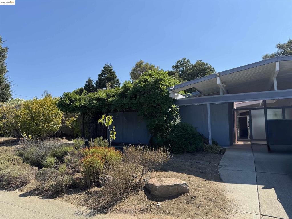((OPEN HOUSE: Sun. 8/17 11am - 1pm)) WOW! Unbelievable price for a Castro Valley Eichler. This home is priced to sell quickly! Bring your vision, your designer, your contractor, and make this excellent Eichler Home everything you've dreamed of. There are so many possibilities with this one. Large front yard with California native plants and succulents. Gorgeous pavers in the backyard create a fantastic outdoor entertainment area and still offer plenty of space for plants and a garden in the side yard. The upper area is fenced to keep pets in, but the lot extends down the hill, giving you a total lot of nearly 14,000 square feet. Inside the home, you'll find an atrium with plenty of space for plants and seating. It is currently covered, but those who prefer the open-air atrium could always remove the skylights. This home offers 4 bedrooms and 2 bathrooms, a formal living and dining room area, plus a kitchen with access to the side yard and a family room off the kitchen. The sky is the limit with this property, and at this unbelievable price, you'll be able to make the changes and upgrades you'd like. **Offer Date is scheduled for August 20th** Don't miss out. Come take a look before it's gone.