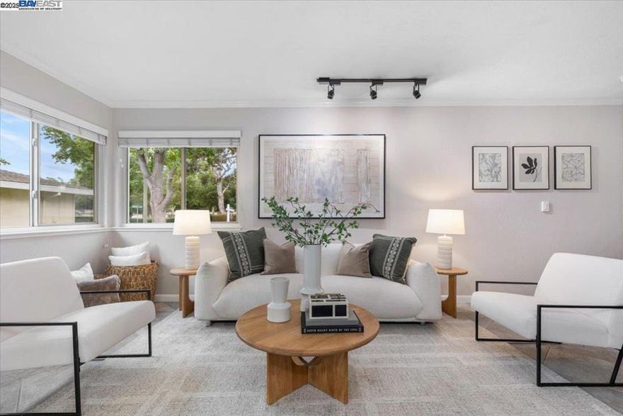 Finally — a home that checks all the boxes! Beautifully updated 2-bedroom condo in Cambrian, right on the Los Gatos & Campbell border. Step inside to fresh interior paint, brand-new stainless steel appliances, modern lighting, and stylish laminate flooring throughout — no carpet here! The renovated bathroom features a sleek vanity and glass shower door for a clean, modern finish. The spacious layout includes two large bedrooms, and the primary suite offers a serene view of mature trees plus a generous walk-in closet — your private retreat.  Enjoy the convenience of in-unit laundry, tandem carport parking for 2 vehicles, and an oversized storage closet rarely found in condos. This unit is larger than most within the community and enjoys a prime location set among lush, manicured lawns. The HOA makes life simple by covering water, garbage, landscaping, and access to the sparkling pool.  With top Cambrian schools, proximity to Good Samaritan Hospital, Hwy 85/17, local parks, and scenic trails, the location couldn’t be better. Whether you’re a first-time buyer, downsizing to a low-maintenance lifestyle, or investing in a high-demand neighborhood — this is the opportunity you don’t want to miss. Come see it and fall in love!