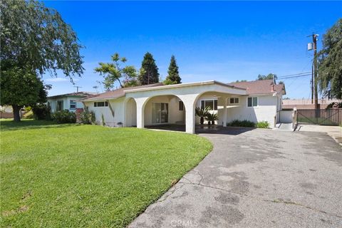 Photo of 1317 S Ardilla Ave, West Covina, CA 91790 (MLS # CV26086530)