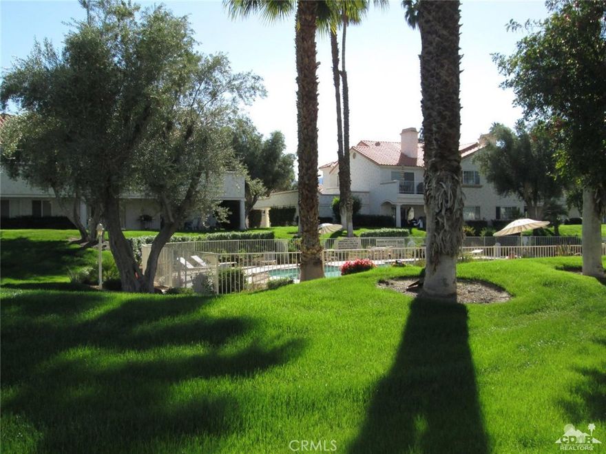 Lower level villa, with a wonderful location on a large greenbelt and sparkling pool! Three bedrooms, two baths + powder in approx. 1814 SF. Fresh paint. Unit has been in the same family since it was built. Please see private remarks if interested in property.