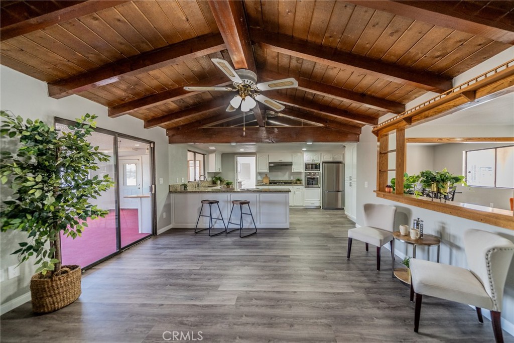 POTENTIAL NEXT GEN HOME!
Versatile Living on Nearly Half an Acre in Riverside! This move-in-ready 3-bedroom, 2-bathroom home sits on nearly half an acre, offering a rare blend of space, comfort, and endless potential—including the opportunity to create a NextGen living space for extended family or rental income (buyer to verify). Boasting 1,740 sq ft of living space, this home features a large living room, separate dining area, and a cozy family room with a fireplace that opens to a beautifully designed kitchen—complete with modern appliances included in the sale. Step outside to a fully enclosed patio with a private spa, perfect for relaxing or entertaining year-round. The true gem? A massive 2,000+ sq ft workshop with five separate workspaces and four access points—ideal for hobbies, business, or storage. Zoned for agricultural use, this property allows for animals like horses or chickens (buyer to verify with city). Whether you're dreaming of multi-generational living, working from home, or simply more room to roam—this one has it all. Don’t miss this second chance to own a truly unique property. Schedule your private tour today!