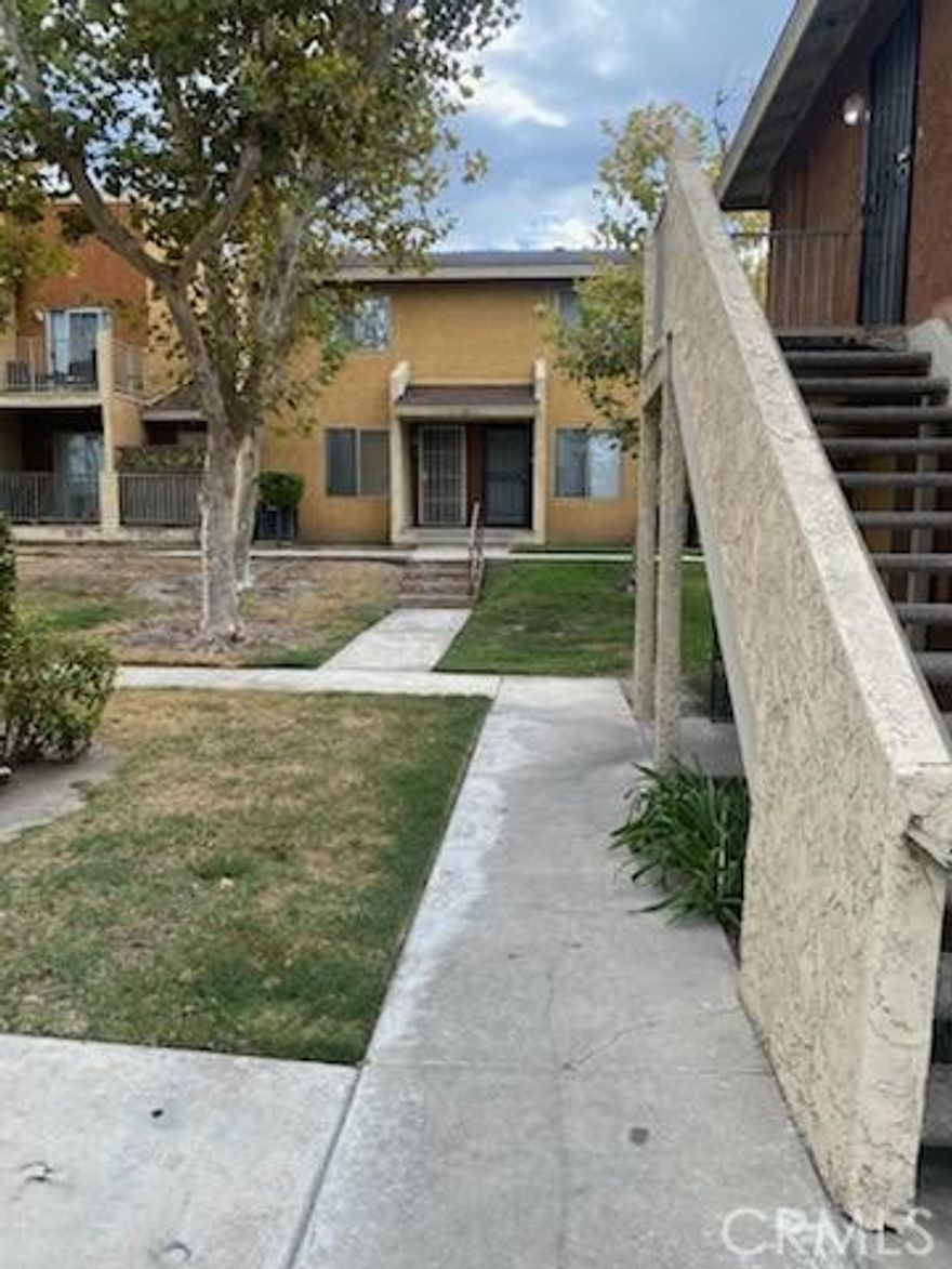 Gated Community condo. Two Floors. Nice 3 Beds and 2 baths Unit. Community features open areas, mountain views, playground, and pool & spa. Great for first time buyer or investor.  Controlled access. Property needs some TLC.  But lots of potential.  Two car garage with private rear access.