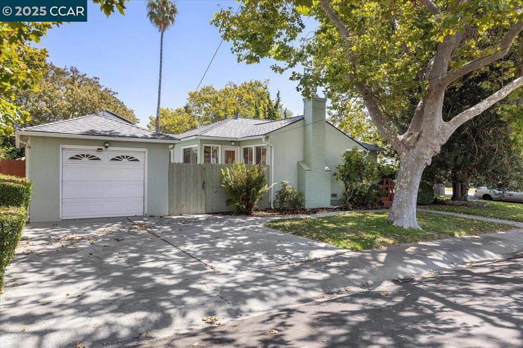 OPEN HOUSE SAT AUG 16 1-3PM|Nestled in the heart of the vibrant San Lorenzo Village, this stunning 3-bedroom, 2-bathroom home offers 1,300 square feet of modern comfort on a beautiful corner lot. Its open floor plan floods the space with natural light, creating a bright and inviting atmosphere. The primary bedroom features a large closet and steps away from its own private bathroom for ultimate convenience and luxury. Featuring solar panels and a tankless water heater for energy efficiency, this residence boasts central heating, updated bathrooms, and a gourmet kitchen with sleek granite countertops, stainless steel appliances, and a spacious pantry for ample storage. Newly polished hardwood floors shine throughout, complemented by freshly painted interiors, newly installed recessed lighting, and dual-pane windows. Cozy up to the modern electric fireplace, perfect for relaxing evenings. A convenient laundry room adds practicality, while the prime location places you steps away from top-rated schools, shopping, the post office, and more. This move-in-ready gem combines style, functionality, and an unbeatable location!