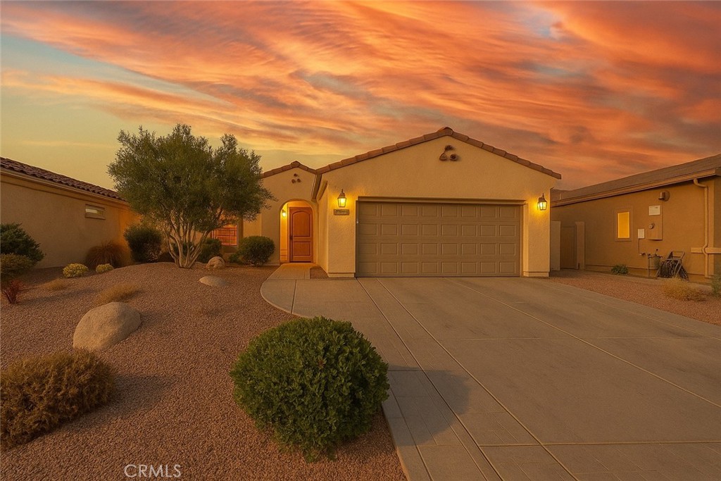This beautiful single-story home offers the perfect blend of comfort, style, and functionality, featuring an open-concept layout filled with natural light that makes everyday living and entertaining effortless. The spacious living area flows seamlessly into a modern kitchen with ample cabinetry, sleek countertops, and a welcoming breakfast bar where family and friends can gather. A private primary suite with a walk-in closet and en-suite bath provides a relaxing retreat, while the additional bedroom offer flexibility for guests, a home office, or a growing family. Outside, the backyard invites you to enjoy the California sunshine with plenty of space for weekend BBQs, gardening, or simply unwinding. Complete with an attached two-car garage and ideally located near shopping, dining, parks, and schools, this home combines convenience and lifestyle in one perfect package.
