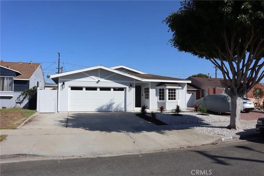 Welcome to your 2,225 square feet, 4 bedroom, 3 bath home on one of the nicest streets in Gardena!  The home has large master suite with full bathroom and an additional bonus room at the front of the house. The home is just newly painted, inside and out, new porcelain flooring, new exterior light fixtures, new front yard landscaping, brand new garage doors, and the solar is fully paid for!  This home is ready for your family to move in!