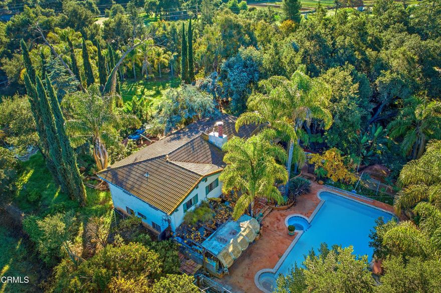 Looking for privacy and serenity in the Ojai Valley??? Here's your chance, enjoy Country Style living, just minutes from downtown, while feeling completely off the grid.  So much potential on the nearly 2 acre lot, of flat usable land, surrounded by numerous established Oak Trees, zoned for horses, with your own well!!!  Spanish Style 2 story home features 6 Bedroom with 3 Bathrooms, with 2560 sq. ft. of living space.  Island Kitchen, Living Room w/ Fireplace and room formal dining.  Enjoy indoor/outdoor living with deck of the living room that is surrounded by Oak Trees, ideal for gatherings. Outside is a good sized swimming pool/spa with water fall, perfect to enjoy the outdoors. The barn/workshop is over 2800 sq. ft, plenty of space for storage/equipment, also does has rooms. for potential income producing opportunity.  There is access form the road adjacent to the barn for large vehicle/heavy equipment entry. 2 barrancas on both sides of the property, private entry from the road, surrounded by numerous  trees that give great shade to keep cool.    Garden area, to grow crops, with no shortage of water, space for stables, and Horse Trail right outside of the property makes this an ideal location all while being close to downtown Ojai and just a short drive down to Ventura's World Class beaches!!!!