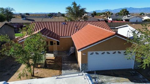 Photo of 10917 Bartlett Avenue, Adelanto, CA 92301 (MLS # HD25230139)