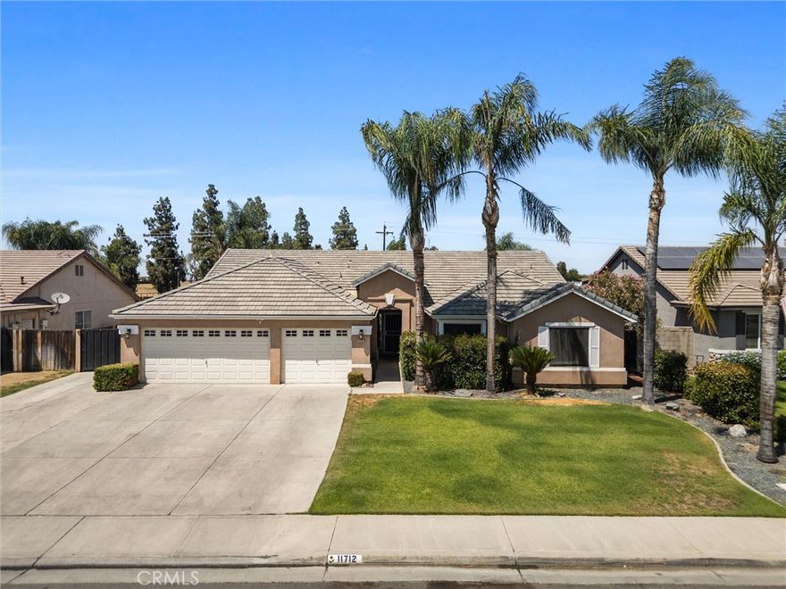 Don't miss out on this beautifully updated home in the desirable Avalon neighborhood of Northwest Bakersfield--just a short walk from Norris Elementary School! Inside, you'll find 4 bedrooms and 3 remodeled bathrooms with wood-look tile flooring throughout. The huge primary bedroom provides plenty of space to relax. The updated kitchen features quartz countertops with a farm sink and stainless steel appliances, where you can dine and gather with family. The large great room can be used for whatever fits your needs, whether it be for formal living or dining, a game room or office space. It's perfect for both everyday living or hosting special occasions. This premium lot located near the cul-de-sac has a huge yard with a sparkling POOL, a fully covered patio and RV gated parking and two sheds for extra storage. There's also a 3 car garage w/epoxy floors, an A/C & heating split unit, with insulated garage doors. If you're looking for that perfect home in top school districts, here it is!