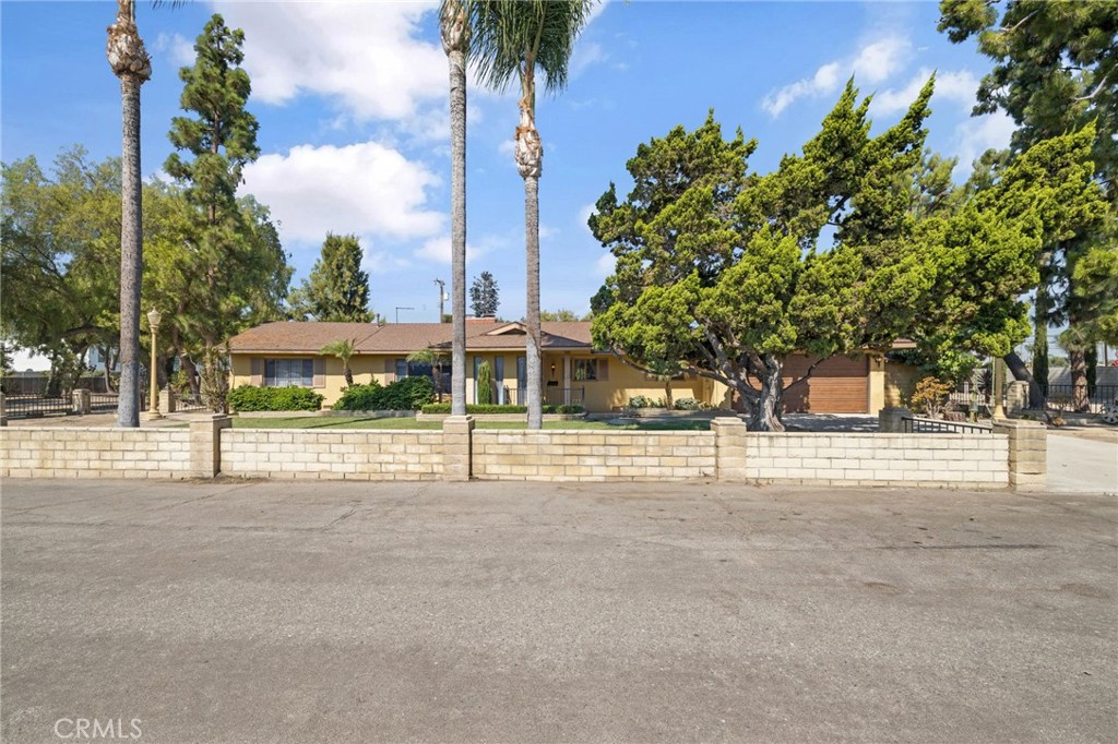 A Rare Anaheim Acre Oasis-First Time on The Market! Welcome to this one-of-a-kind property on serene Cherry Tree Ln, a private haven lined with beauty and charm. Here you'll find fantastic, supportive neighbors who create a true sense of community, where friendly waves, shared laughter and helping hands are a part of everyday life. This is more than just a street-it's a place where great memories are made and lasting camaraderie thrives. Nestled in the heart of Anaheim on a beautiful one-acre lot, this ranch style home sits in the center, offering privacy, space and endless possibilities. The Home features 3 bedrooms, 2.5 baths, and the potential for a 4th bedroom. The kitchen radiates nostalgic charm with its vintage oven and cozy breakfast nook. Multiple living spaces make it ideal for both everyday comfort and entertaining.
The expansive grounds provide room for gardens, animals a pool-endless opportunities. Additional property highlights include a barn, greenhouse and two storage sheds.
Though it feels like a peaceful retreat, you're just minutes from top schools, dining, shopping, and world-famous attractions like Disneyland and the Honda Center.
Don't miss this rare opportunity to own a unique piece of Anaheim history---properties like this don't come along often!