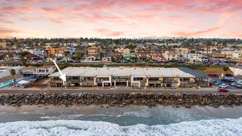 Photo of 700 S The Strand #102, Oceanside, CA 92054 (MLS # NDP2607985)