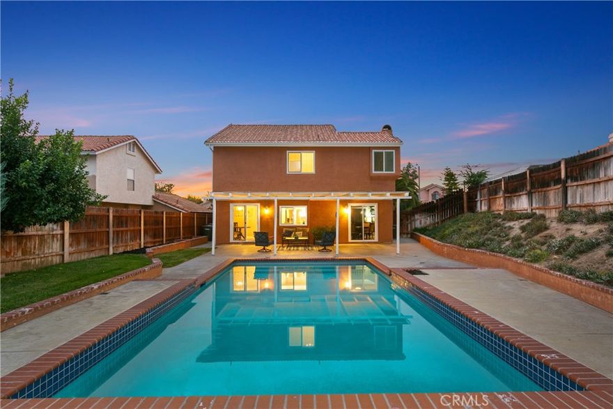 Remodeled Temecula Pool Home! Located on a sunny suburban street, this 3 Beds / 2.5 Baths, 1458 Sq Ft property offers both a family-focussed & modern layout with refreshed features to match. Travel up the front porch past the new dual-pane bay window overlooking well-manicured flower beds. Once inside, follow the chic dove grey laminate floors into the living room & notice the two-story ceilings showering the entry with natural light. Continue past the spacious living room into the kitchen's sliding glass access to the backyard built for tranquil gatherings with family & friends. The multi-level patio stretches from the covered patio area surveying the masonry-coping pool stretching to the far end of the backyard where the raised patio section seats another group of loved ones. Back inside, trek the mod stairs to the second level where the distinctive layout of each bedroom welcomes a seamless flow of sunlight & a lofty feel that overlooks the first floor. The addition of the plantation shutters and curtain allows versatility to use the open space as a loft or 4th bedroom.  Reset & relax in the master bedroom where sliding glass closet doors reflect the brightness of the large picture window & the updated dual-sink vanity offers space to pamper yourself in style. Additional bedrooms each feature a new dual-pane window & modern light fixtures, plus a full bathroom with a stylish updated vanity. Addtn'l features include: attached 2-car garage with fresh white automatic door, powder room, Spanish tile roof, fresh paint, new windows, minutes from Temecula shopping & nature reserves, I-215, I-15, Award-Winning Temecula Schools.