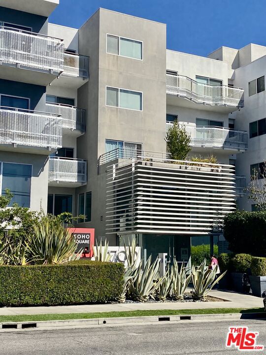 Welcome to this beautifully appointed 2-bedroom, 2-bathroom residence in the highly sought-after SoHo Square complex, ideally located in the vibrant Sawtelle Japantown / West LA neighborhood. Freshly painted and featuring brand-new carpet, the home feels crisp, modern, and move-in ready.The open-concept layout features an L-shaped living and dining area with soaring 9+ foot ceilings and elegant bamboo flooring, flowing seamlessly to a private patio through sliding glass doors. The modern kitchen is outfitted with dark oak cabinetry, white stone counters, and a stylish white glass tile backsplash, offering ample storage along with energy-efficient stainless steel appliances including a refrigerator, dishwasher, range/oven, and microwave.Both bedrooms are generously sized with excellent closet space, and the primary suite offers comfort and privacy. A stacked gas washer/dryer is located inside the unit for convenience.Additional highlights include two assigned, non-tandem garage parking spaces and access to three community courtyards: one with a cozy fire pit, another with dual fireplaces and a gathering area, and a welcoming courtyard near the front lobby.Perfectly situated close to the 405 freeway, and within walking distance to acclaimed restaurants, trendy bars, boutique shops, and the Expo/Sepulveda station, this home blends modern convenience with a lively, walkable lifestyle.Rent includes gas, trash, and water. Sorry, no pets.
